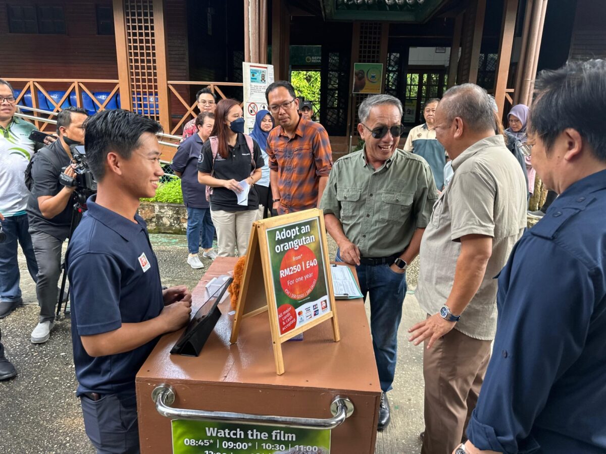 12 01 26 Datuk Jafry with Jonrey adopting at Sepilok LO Cart