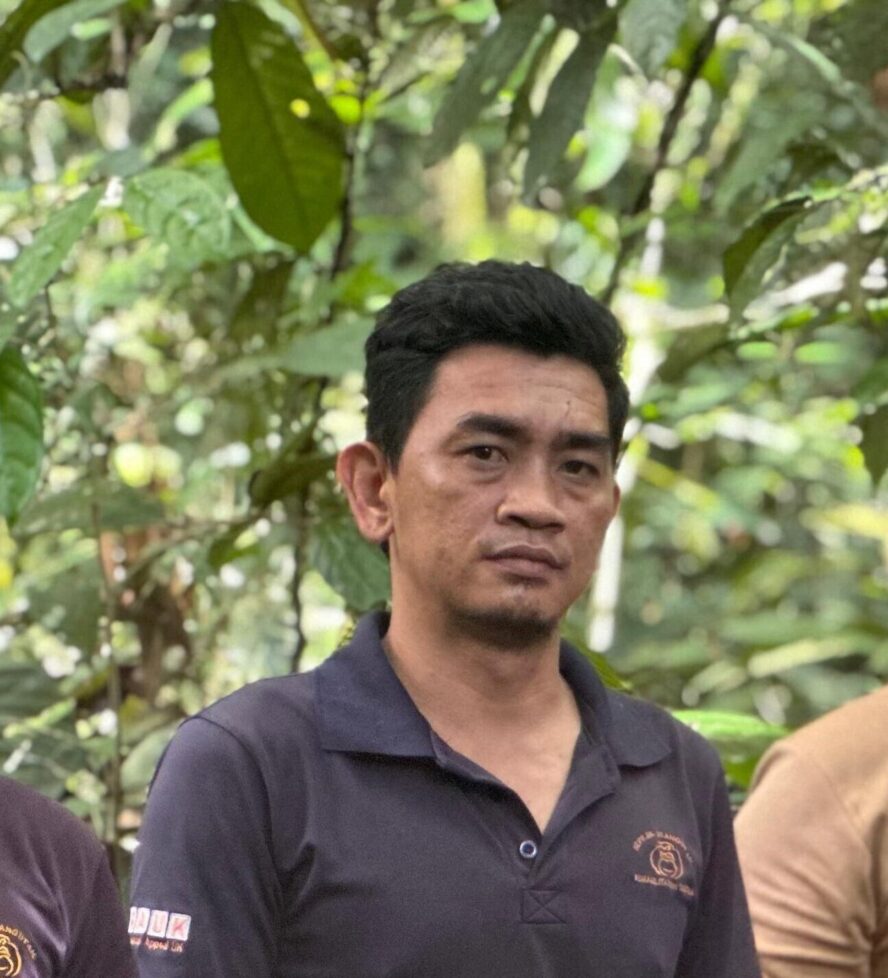 Bonny standing in the rainforest