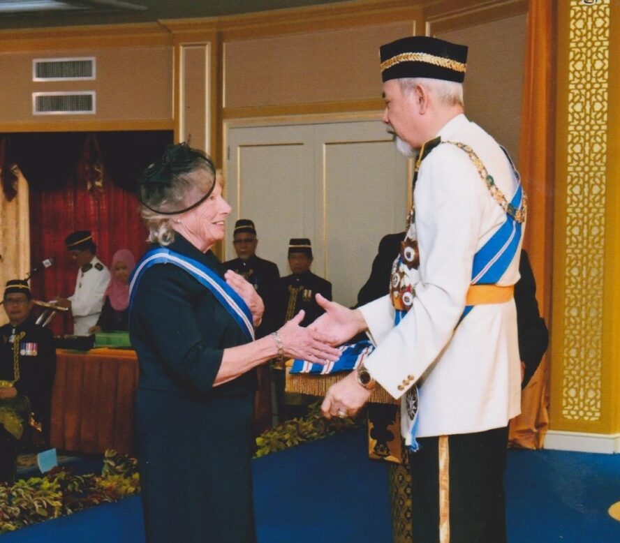 Image: Susan being presented with her Datukship)
