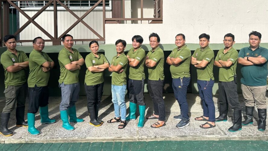 Team photo of Alvin, Bonny, Ibri, Lineker, Arnold Victor, Jergen, Rico, Sylvester, Reklin and Pamik standing in a line with arms crossed and smiling