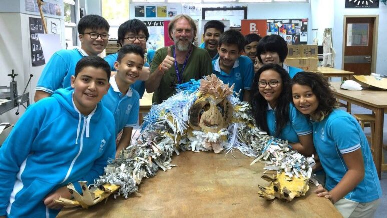 Jacha with orangutan sculpture created in collaboration with school students.