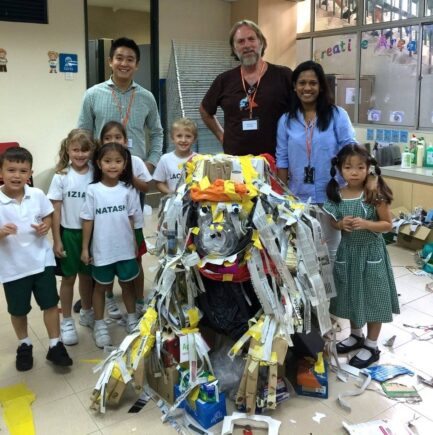 Jacha with orangutan sculpture created in collaboration with school students.