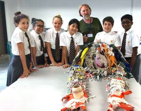Jacha with orangutan sculpture created in collaboration with school students.