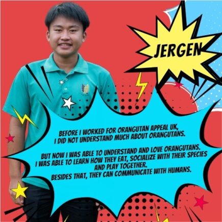 Orangutan Appeal UK staff member standing for a photo with comic book-style graphics surrounding them.