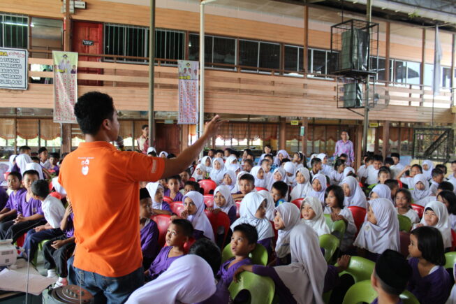 Community outreach in Malaysian schools.