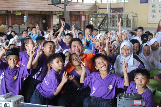 Community outreach in Malaysian schools.