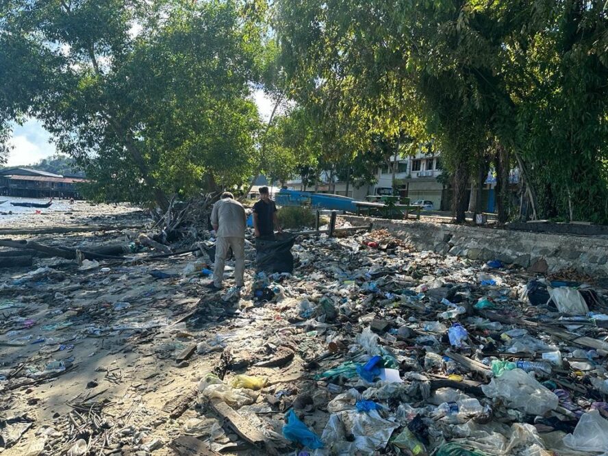Plastic being collected from Sandakan beach.