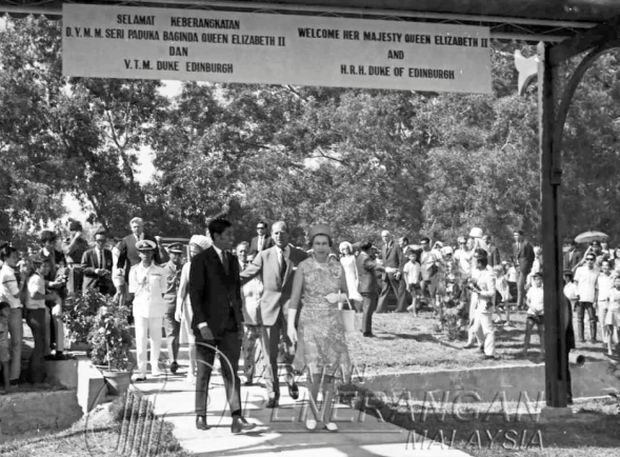 The photograph shows Prince Philip, Queen Elizabeth II and Princess Anne visiting the Prince Philip Park in Kota Kinabalu in 1972.
